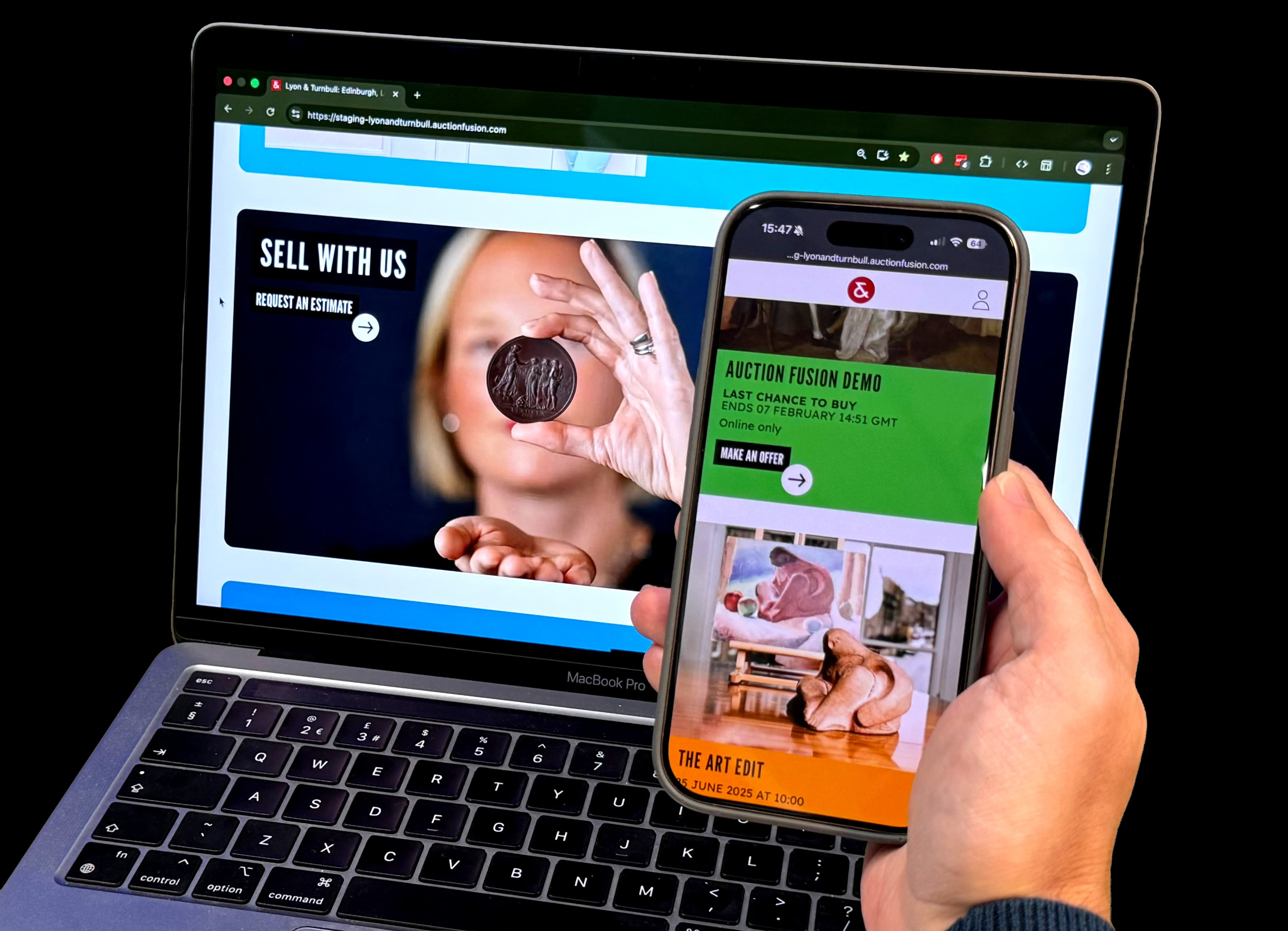 Auction Fusion auction website displayed across desktop and mobile devices
